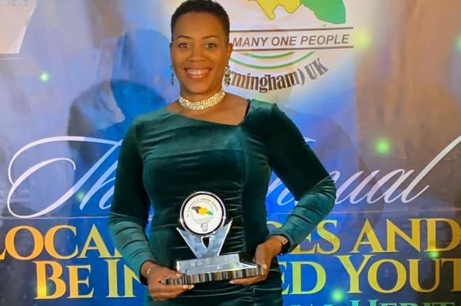 Bethel CEO Madge Milligan Green with her award trophy from the Association of Jamaican Nationals