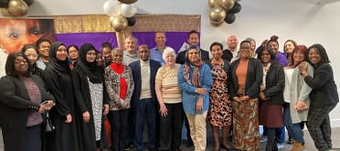 Group picture of attendees at the Thanks for Giving event